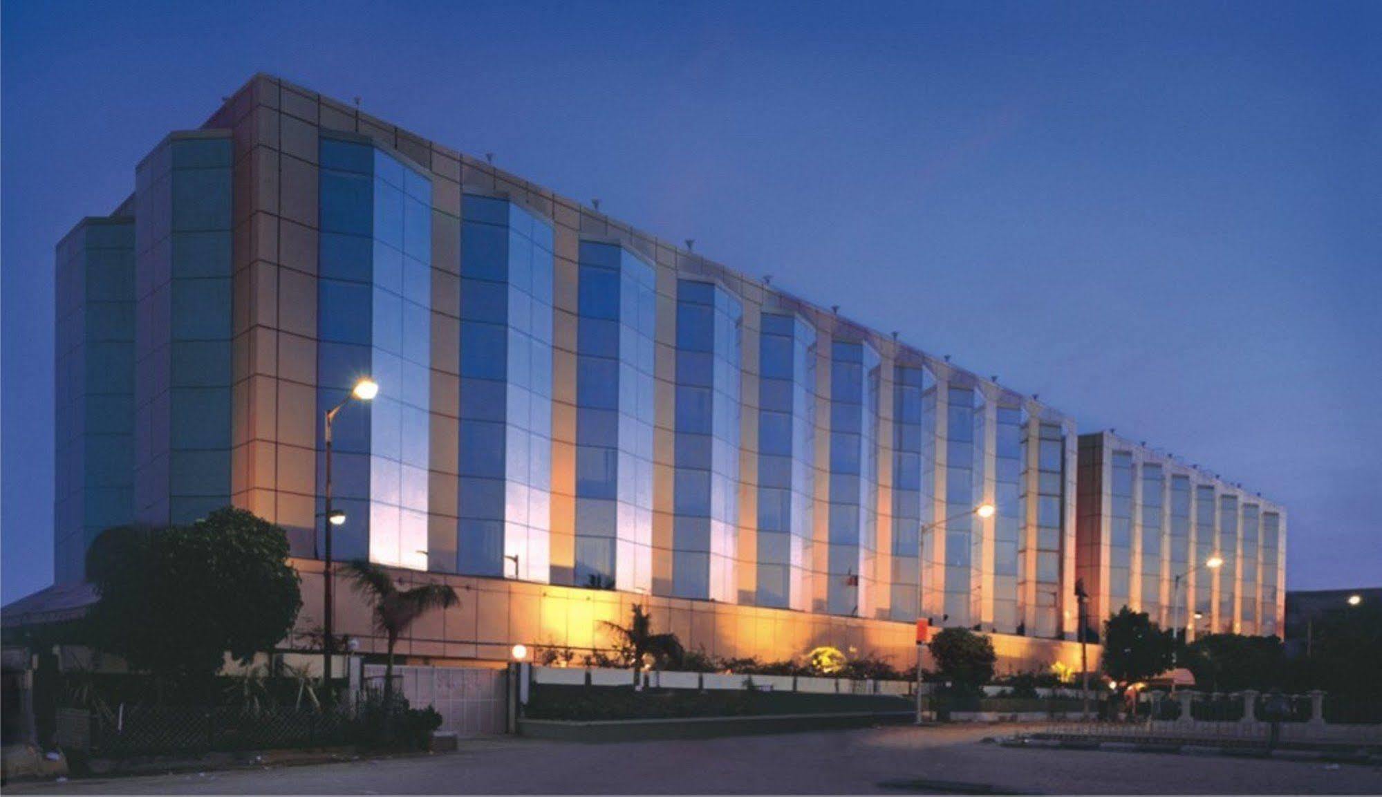 Ramada Plaza By Wyndham Palm Grove Hotell Mumbai Eksteriør bilde The 5-star Grand Hotel